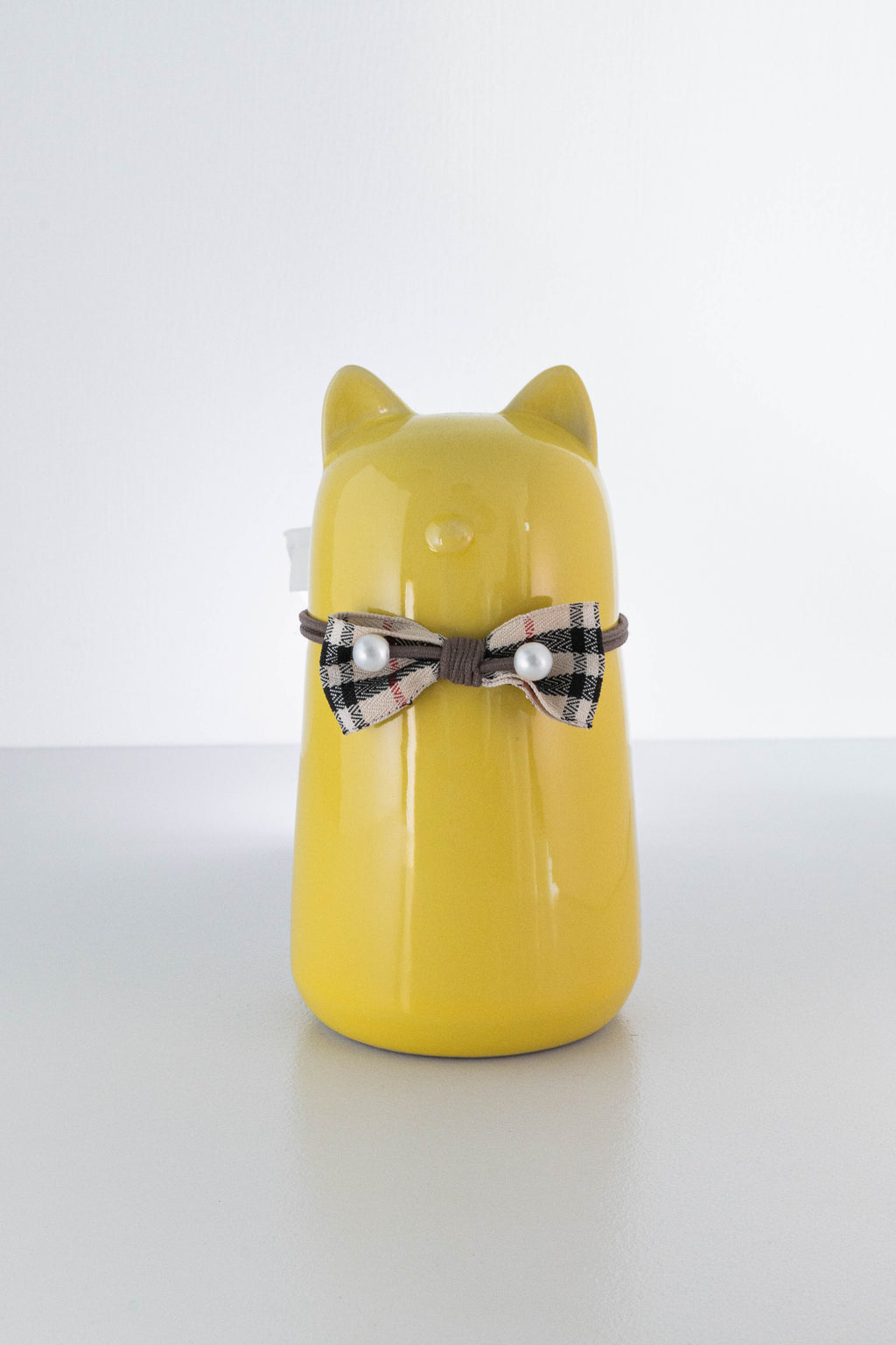 Ceramic Cat Pet Urn for Ashes - Cute Yellow Cat Shape with Plaid Bowtie Accent, Dignified Memorial Keepsake for Small Cats, Decorative Pet Cremation Urn for Home Display